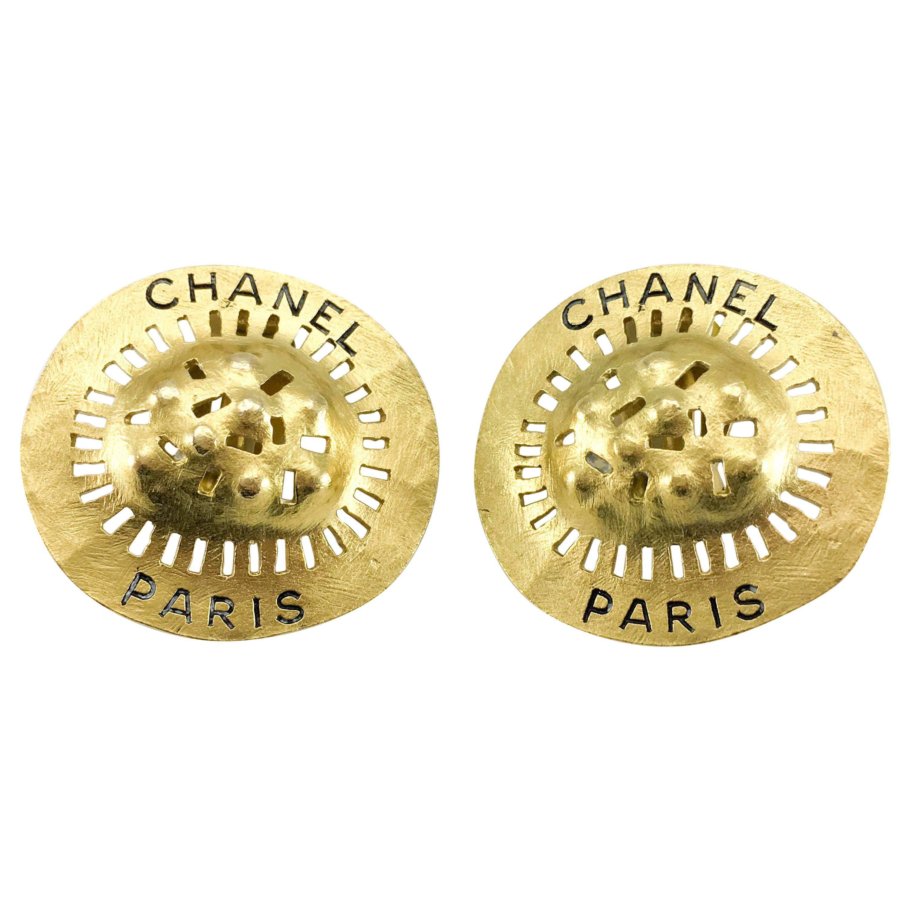 1994 Chanel Shield-Like Medallion Gilt Earrings  For Sale