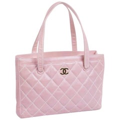 CHANEL Bag in Pink Quilted Smooth Leather with a White Stitching