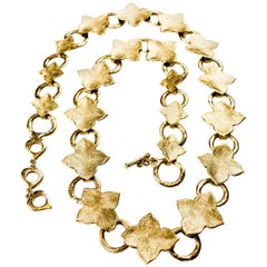 Yves Saint Laurent  lucky charm gold tone chain link belt. Circa 1970  