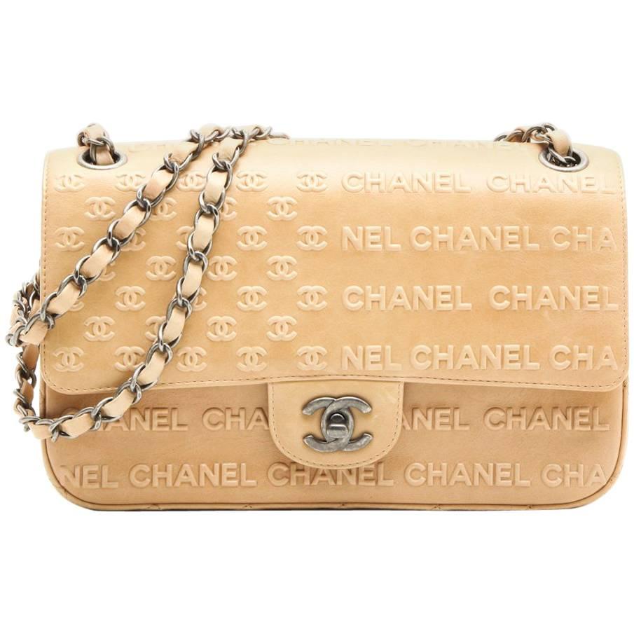 CHANEL 'Timeless' Flap Bag in Beige Embossed 'CHANEL' and 'CC' Lambskin Leather