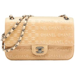 CHANEL 'Timeless' Flap Bag in Beige Embossed 'CHANEL' and 'CC' Lambskin Leather