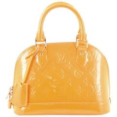 Louis Vuitton Alma BB Vernis Jungle Dots Handbag at 1stDibs