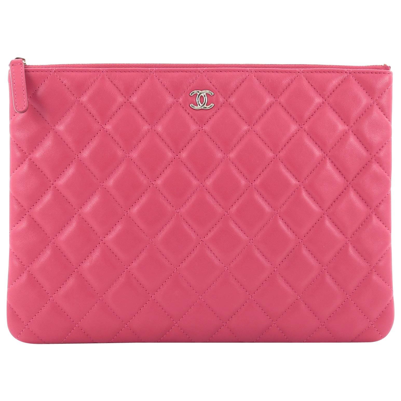 Chanel O Case Clutch Quilted Lambskin Medium