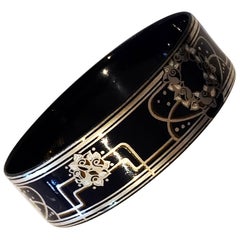 A Silver and enamelled bangle by Michaela Frey