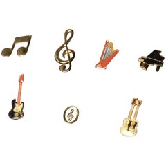 Dolce and Gabbana musical instrument pin/brooch set