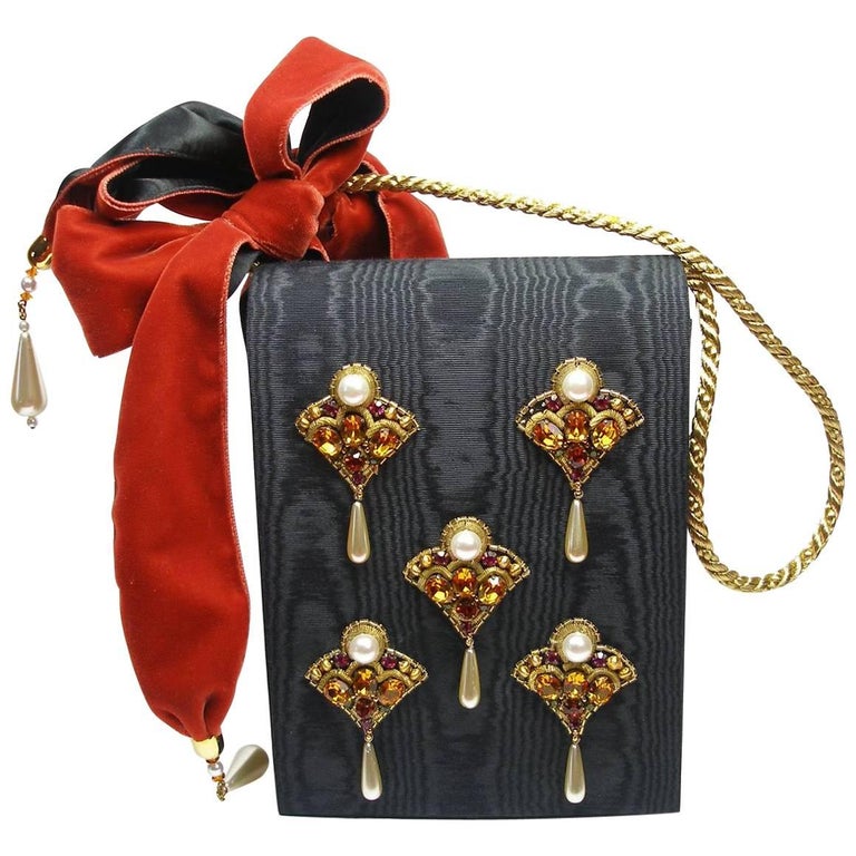 Diamond-studded velvet evening bag.