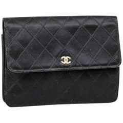 CHANEL Black Clutch in Satin Duchesse and Leather