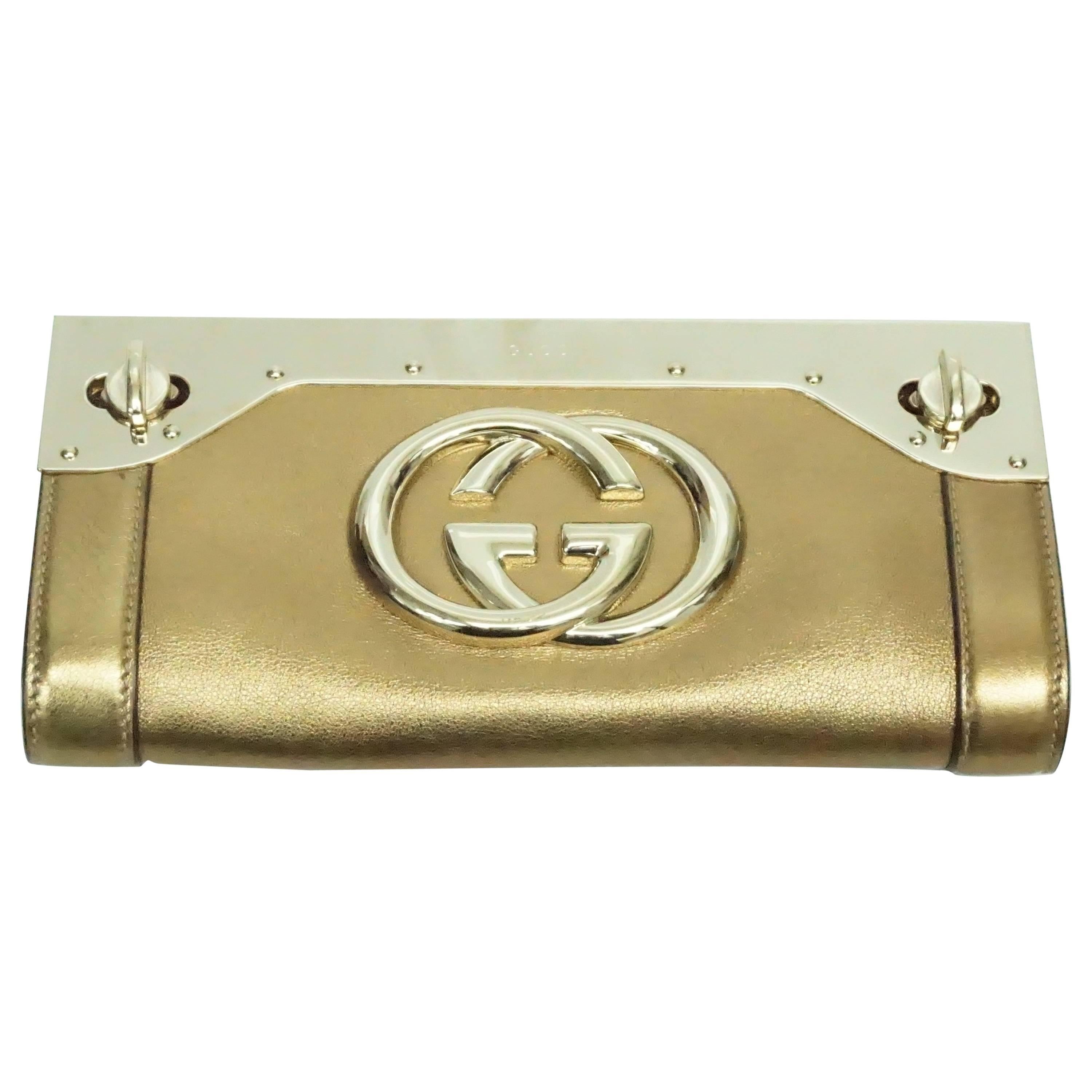 Gucci Bronze Leather and Gold Hardware Britt Clutch at 1stDibs | gucci  britt clutch, gucci metallic leather evening bags, gucci gold clutch