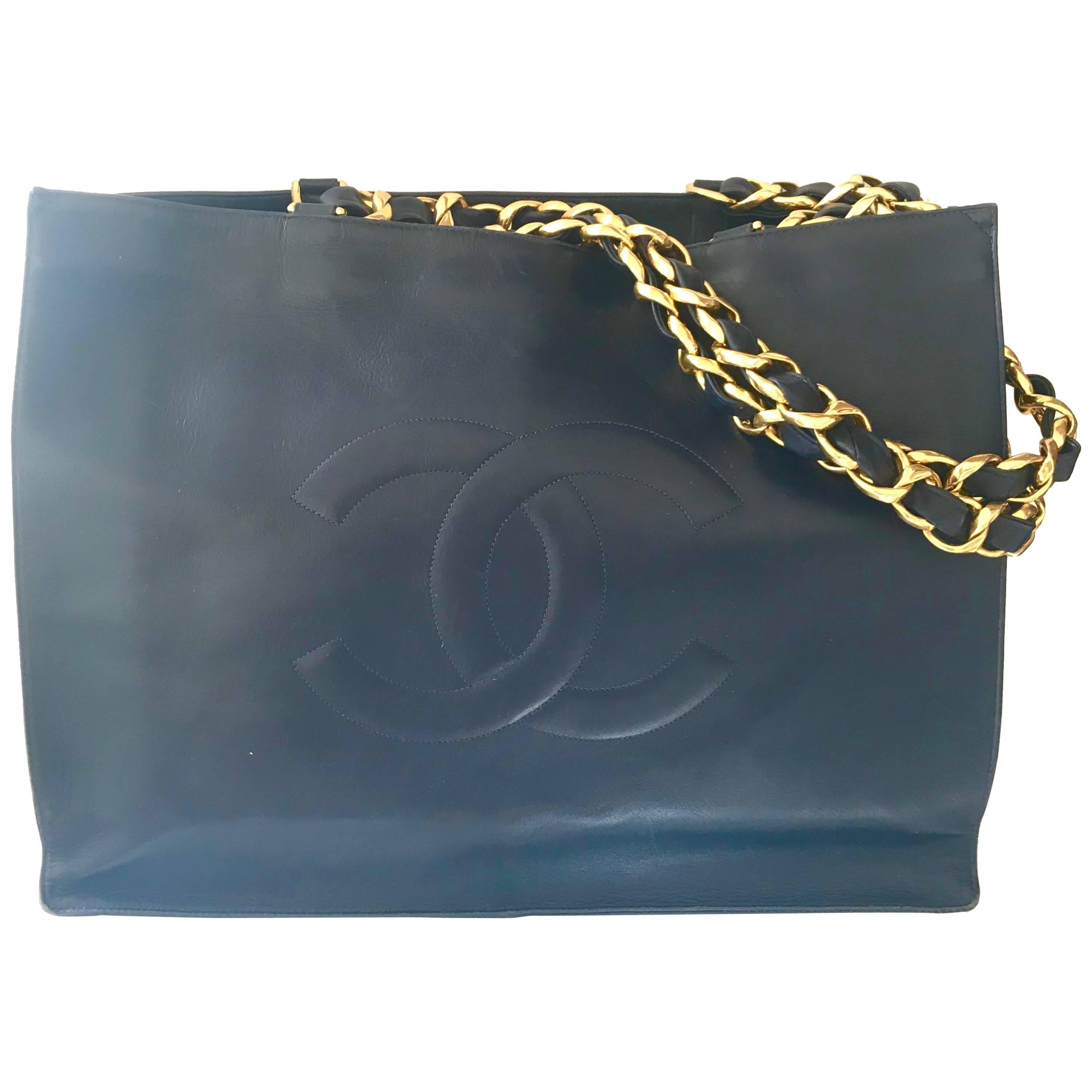 Vintage CHANEL navy calfskin large golden chain shoulder tote bag with large CC.