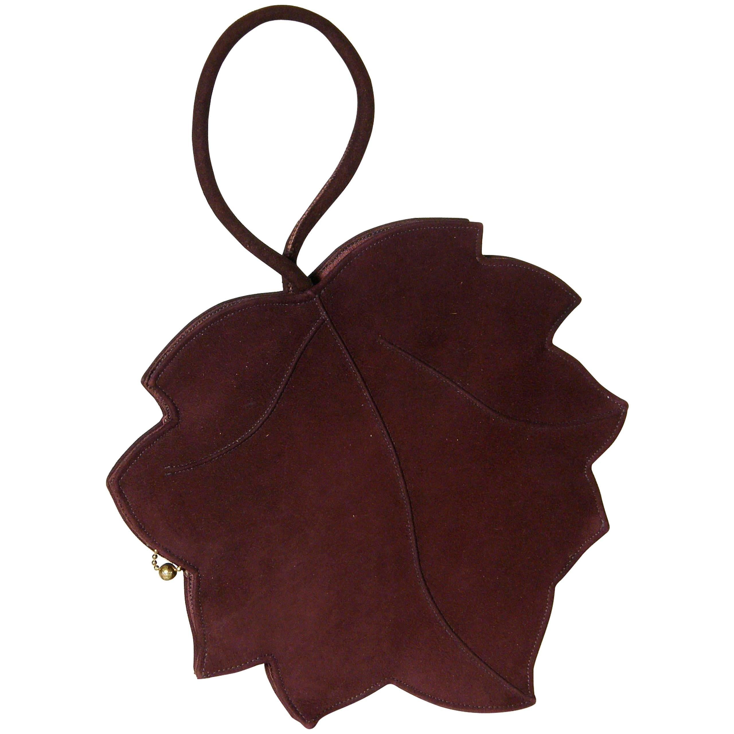 Curvaceous Falling Leaf Shaped Handbag in Aubergine Colored Suede