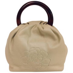Vintage Camellia Detail Chanel Beige Handbag with Tortoise Handles