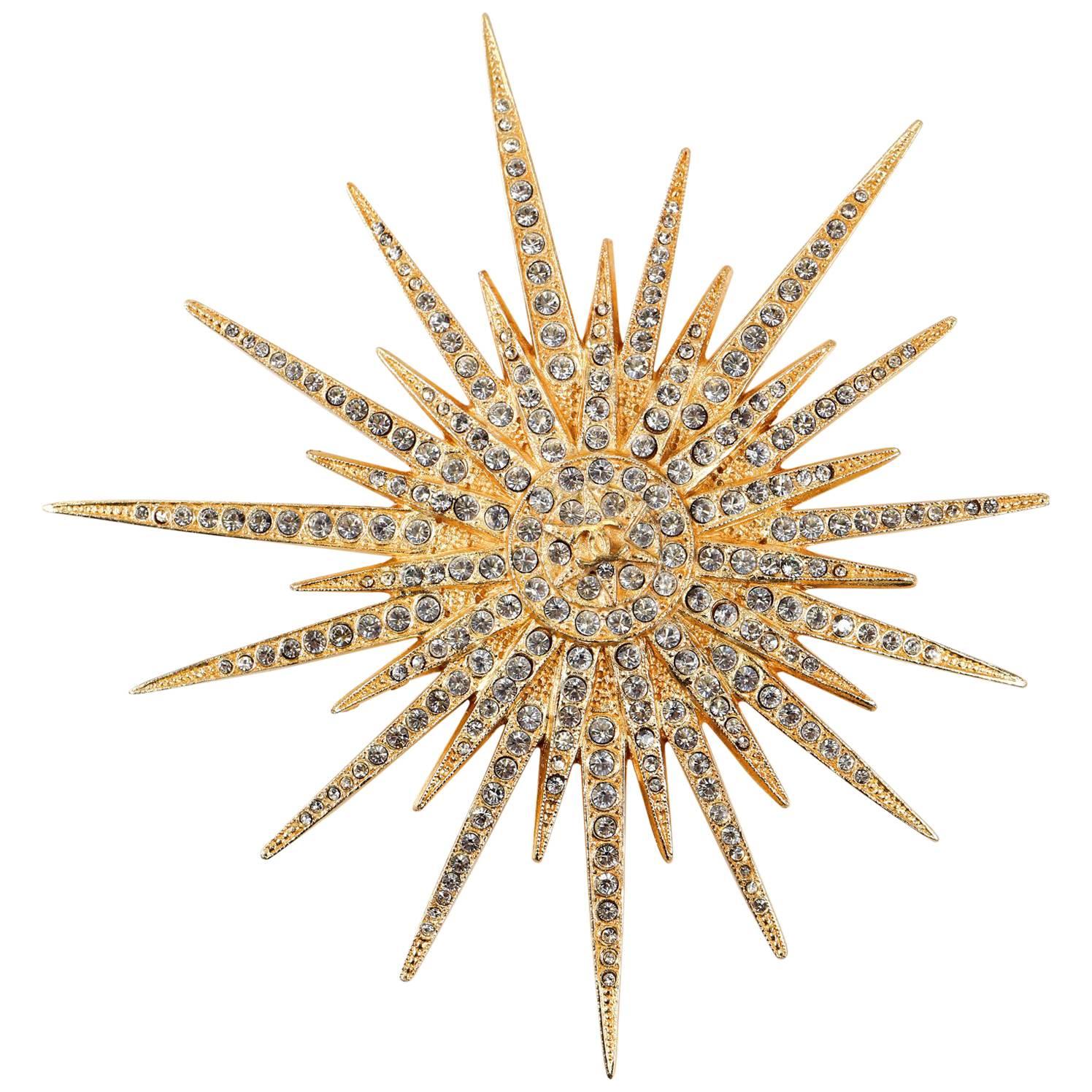 Chanel Gold Starburst Brooch Pin For Sale