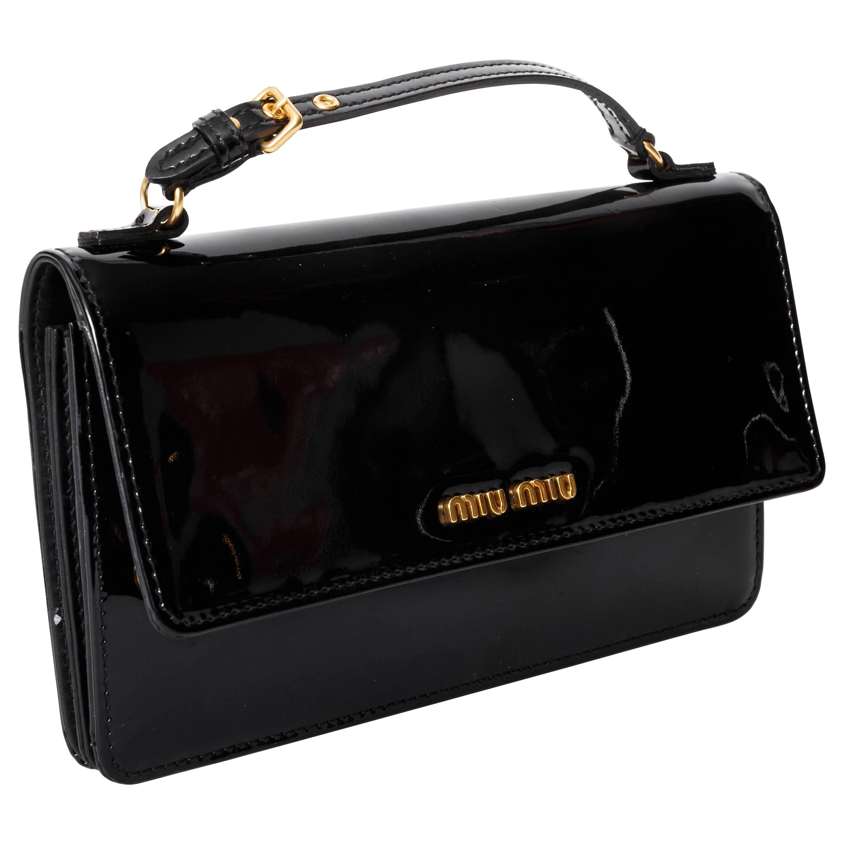 Adorable Miu Miu Handbag in Black Patent Leather 
Double Snap Closure 
Zip Opening