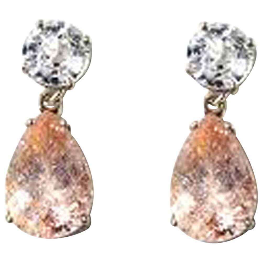 Magnificent 2.52 carats each of glittering round white Cambodian Zircons (7.7 mm) enhance the dingle dangling 5.64 carats each natural pinky Krinkle Morganite (15 mm x 10 mm) set in sterling silver stud earrings.  They measure 1 inch long.  