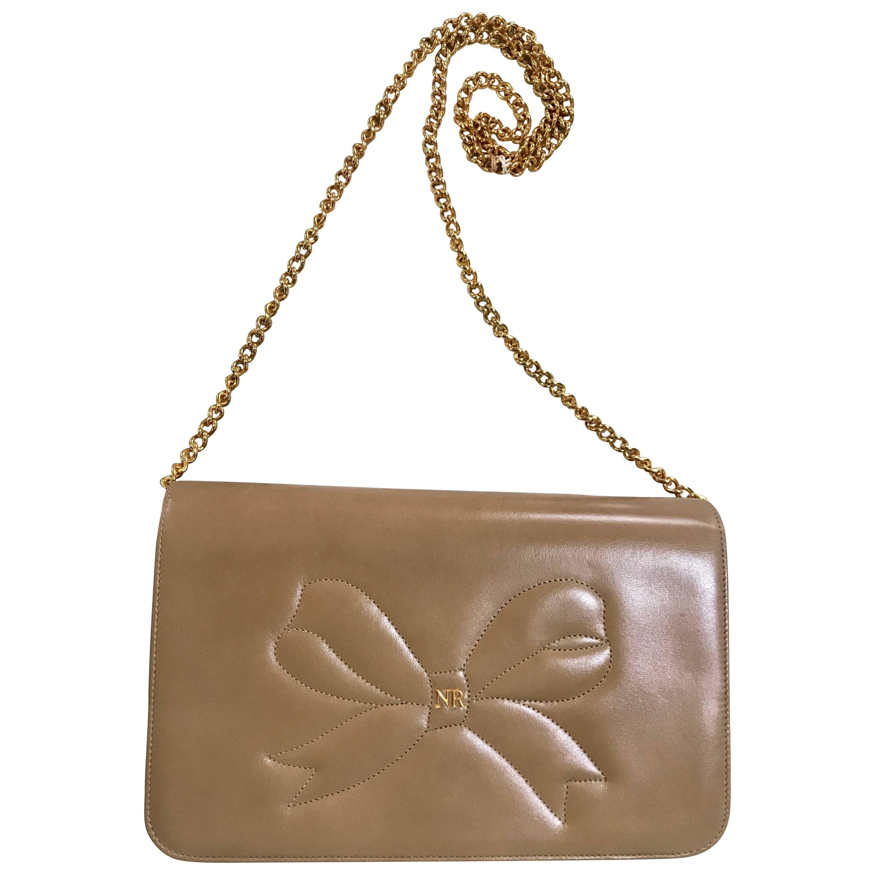 NEW with tag, MINT. Vintage Nina Ricci beige clutch shoulder bag with bow stitch For Sale