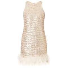 Silver sequin mini dress with feather trim, circa 1965