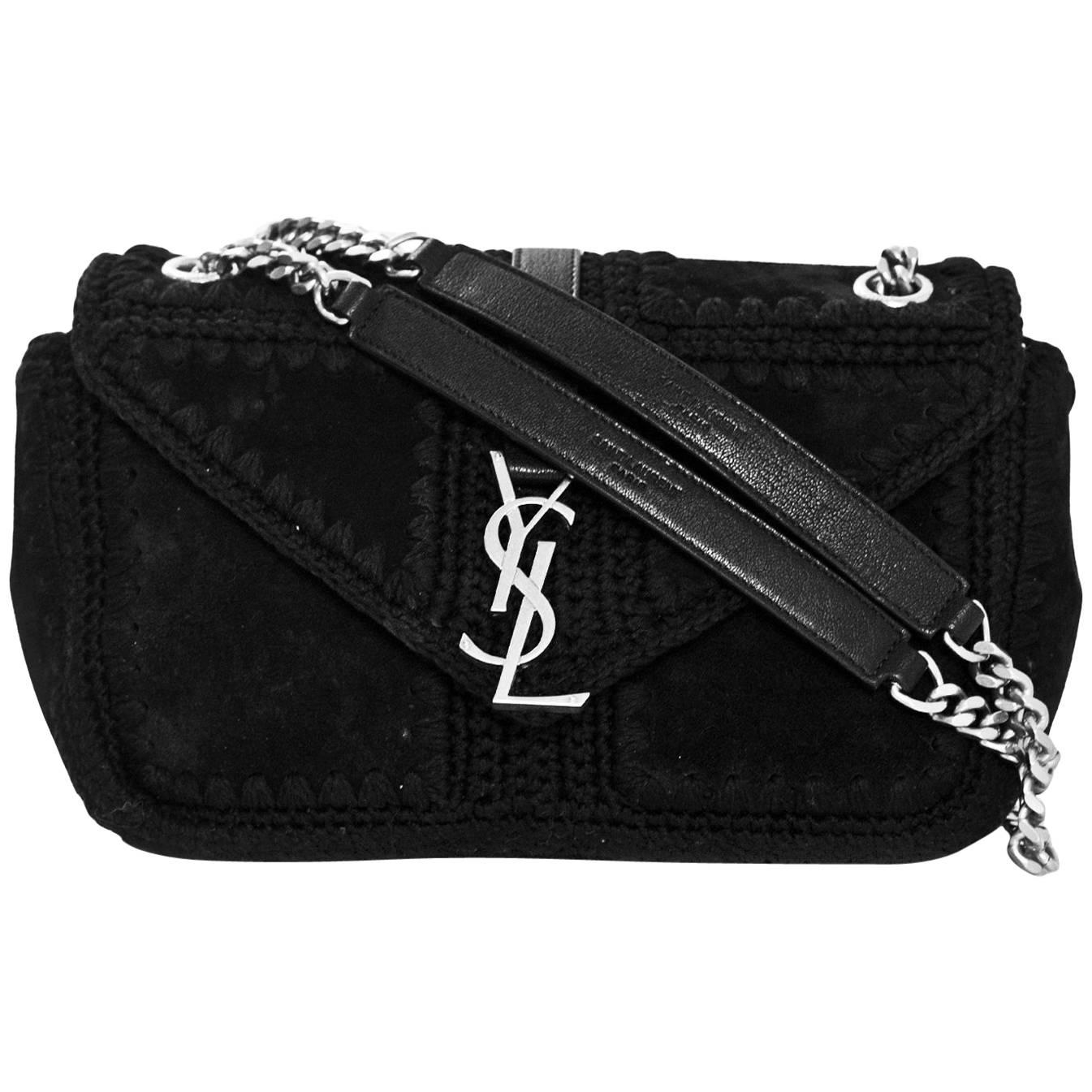 Saint Laurent Black Suede Macrame Monogram Slouchy Chain Medium Shoulder Bag

Made In: Italy
Color: Black
Year Of Production: 2016
Hardware: Silvertone
Materials: Suede, metal
Lining: Black textile
Closure/Opening: Flap top with magnetic snap