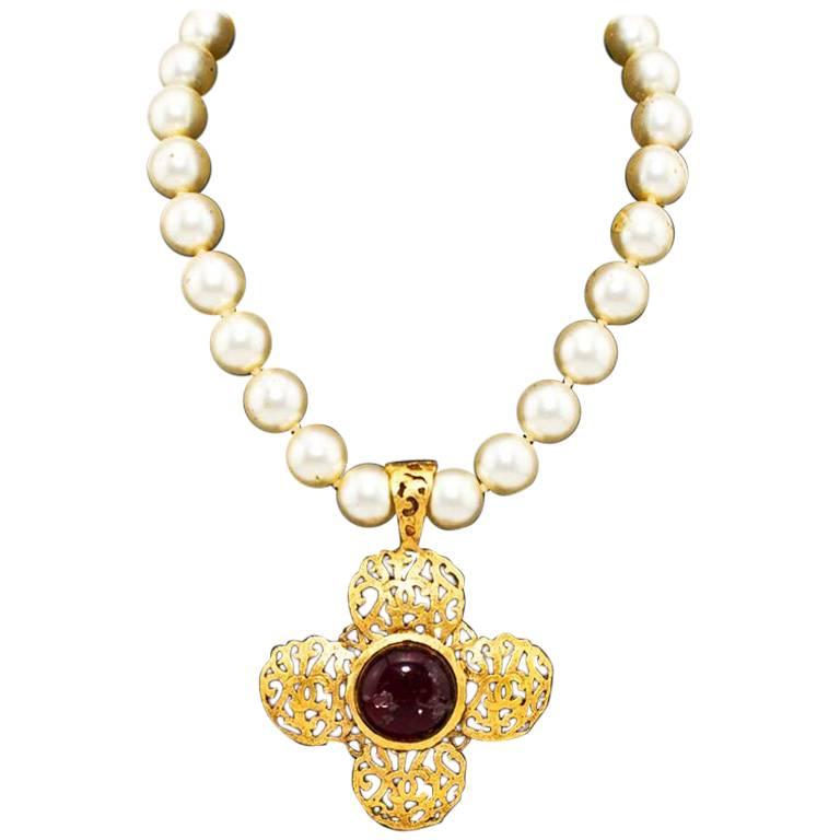1970s Chanel Pearl Necklace with Gold Tone Filigree Pendant and Red Poured Glass