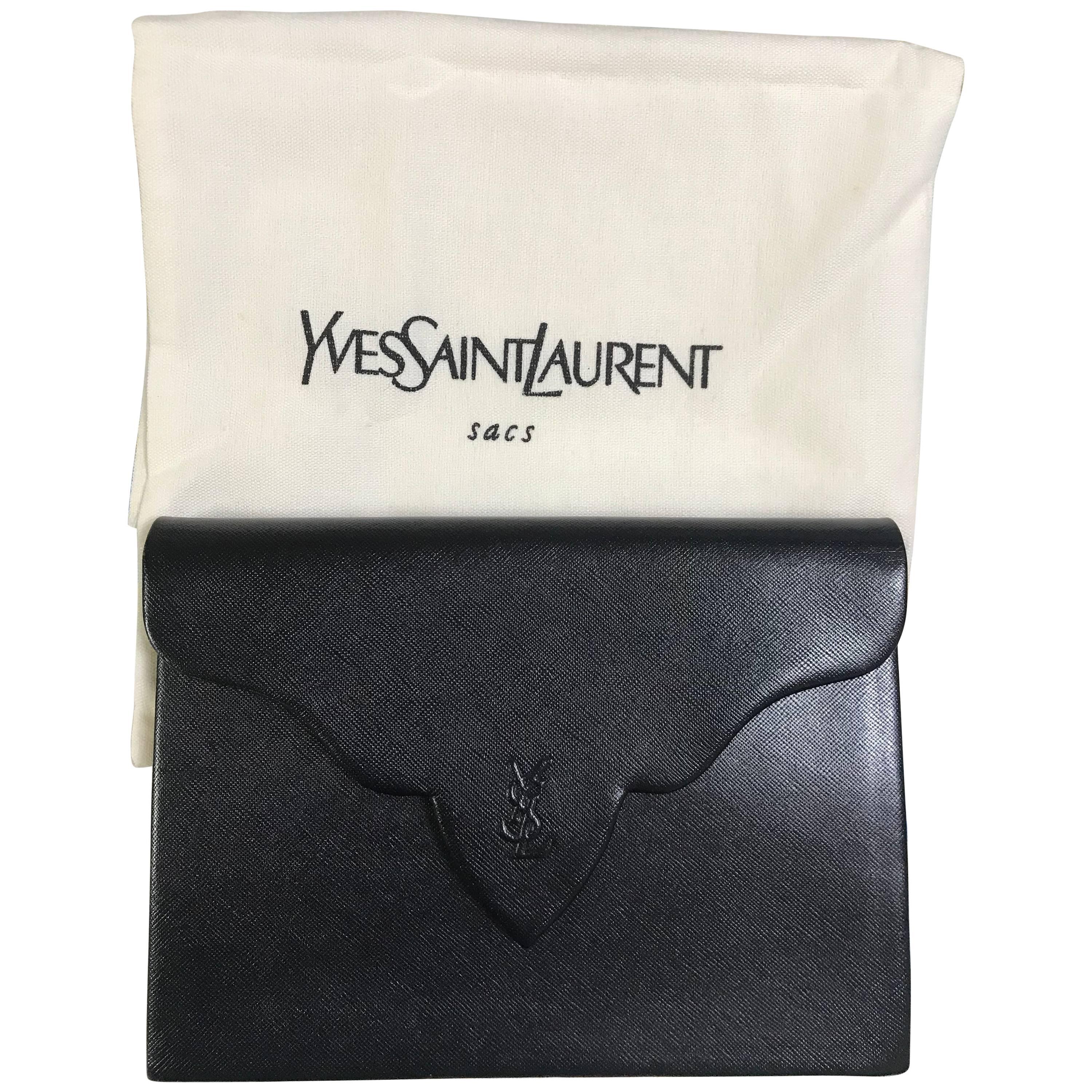 Vintage Yves Saint Laurent genuine black leather clutch purse with beak tip flap