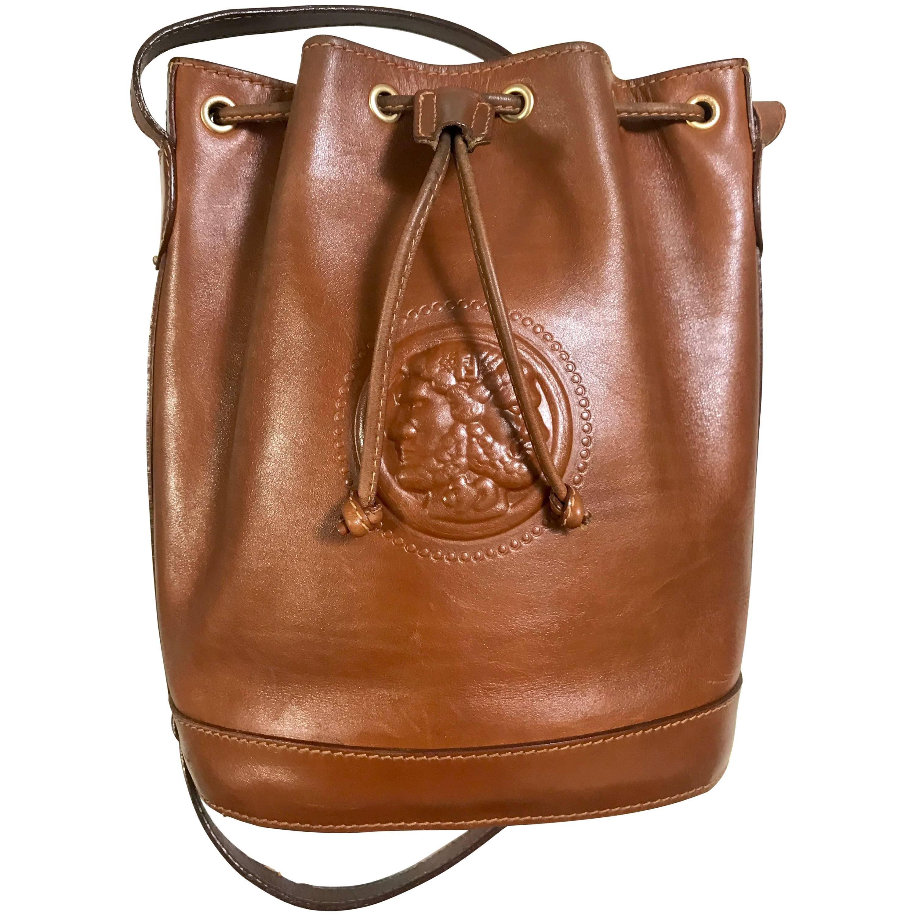Vintage FENDI brown leather hobo bucket, shoulder bag with drawstring and Janus.