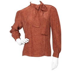 An Early 1980s Vintage Red Yves Saint Laurent Rive Gauche Silk Blouse