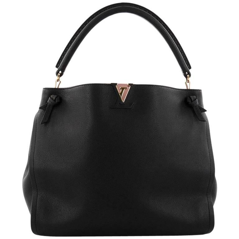Louis Vuitton Tournon Handbag Leather