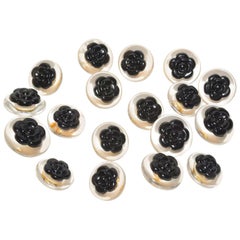 Chanel set of 18 Lucite and Black Camelia Buttons