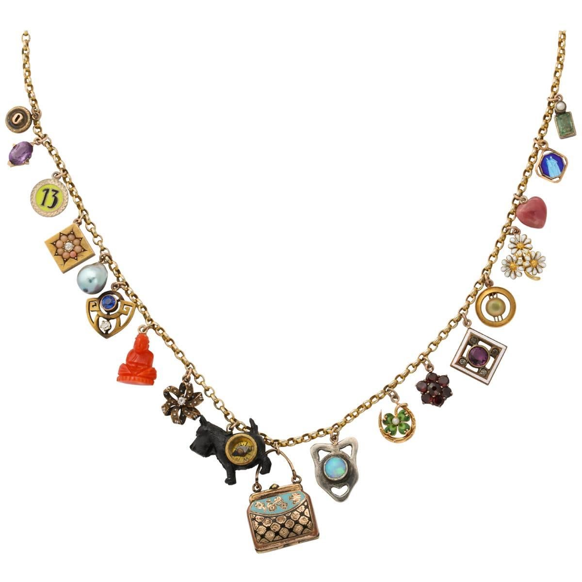 Pocca Book 19 Piece Gold Charm Necklace by Katherine Wallach For Sale