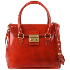 MIU PRADA A/W 2012 Orangefarbene Spazzolato-Lederhandtasche mit Klappe