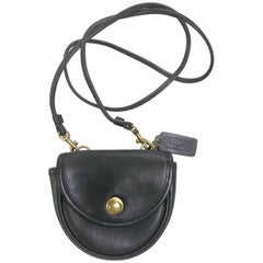 Coach Vintage black leather mini shoulder bag in half moon shape 