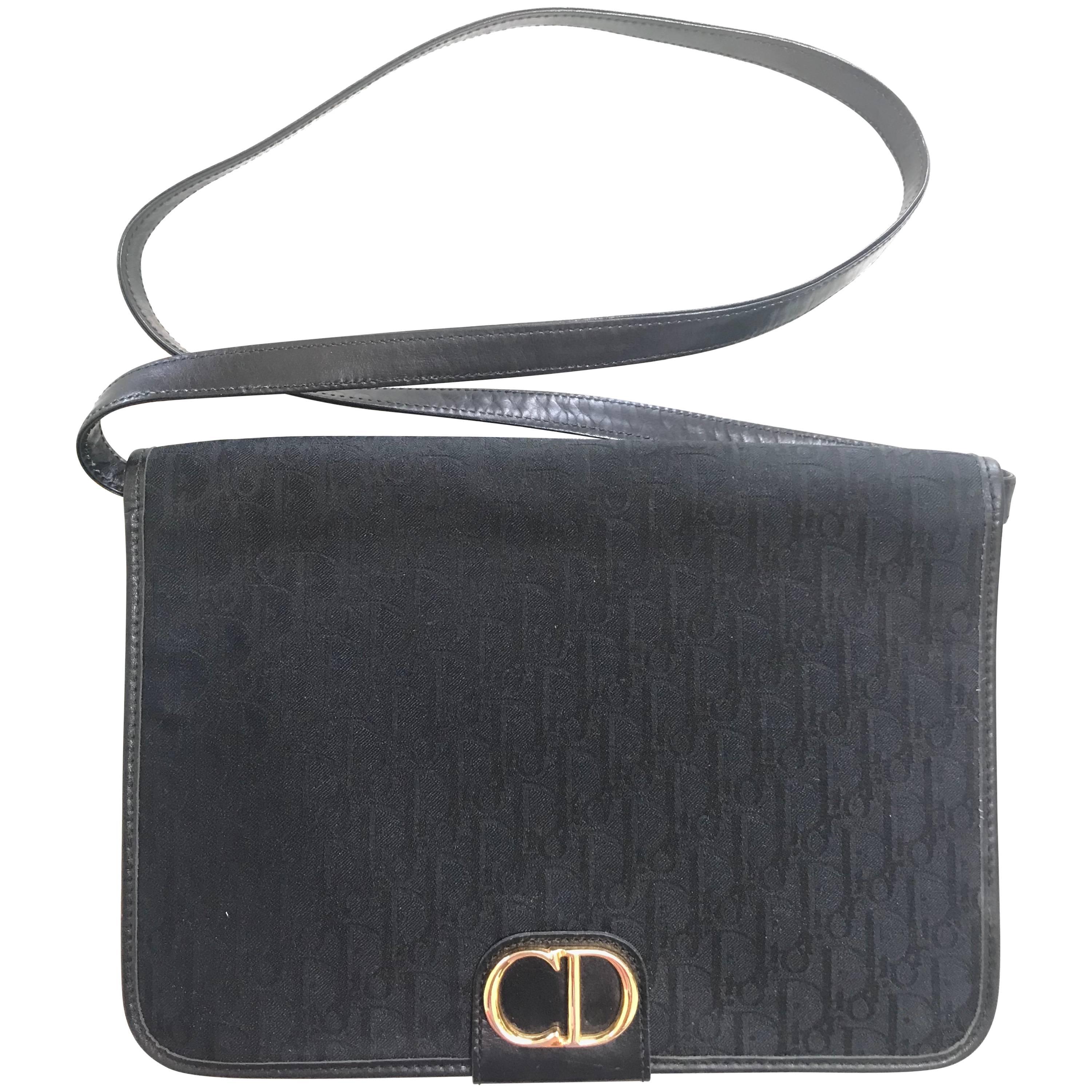 Vintage Christian Dior black logo jacquard shoulder bag, clutch with gold motif. For Sale