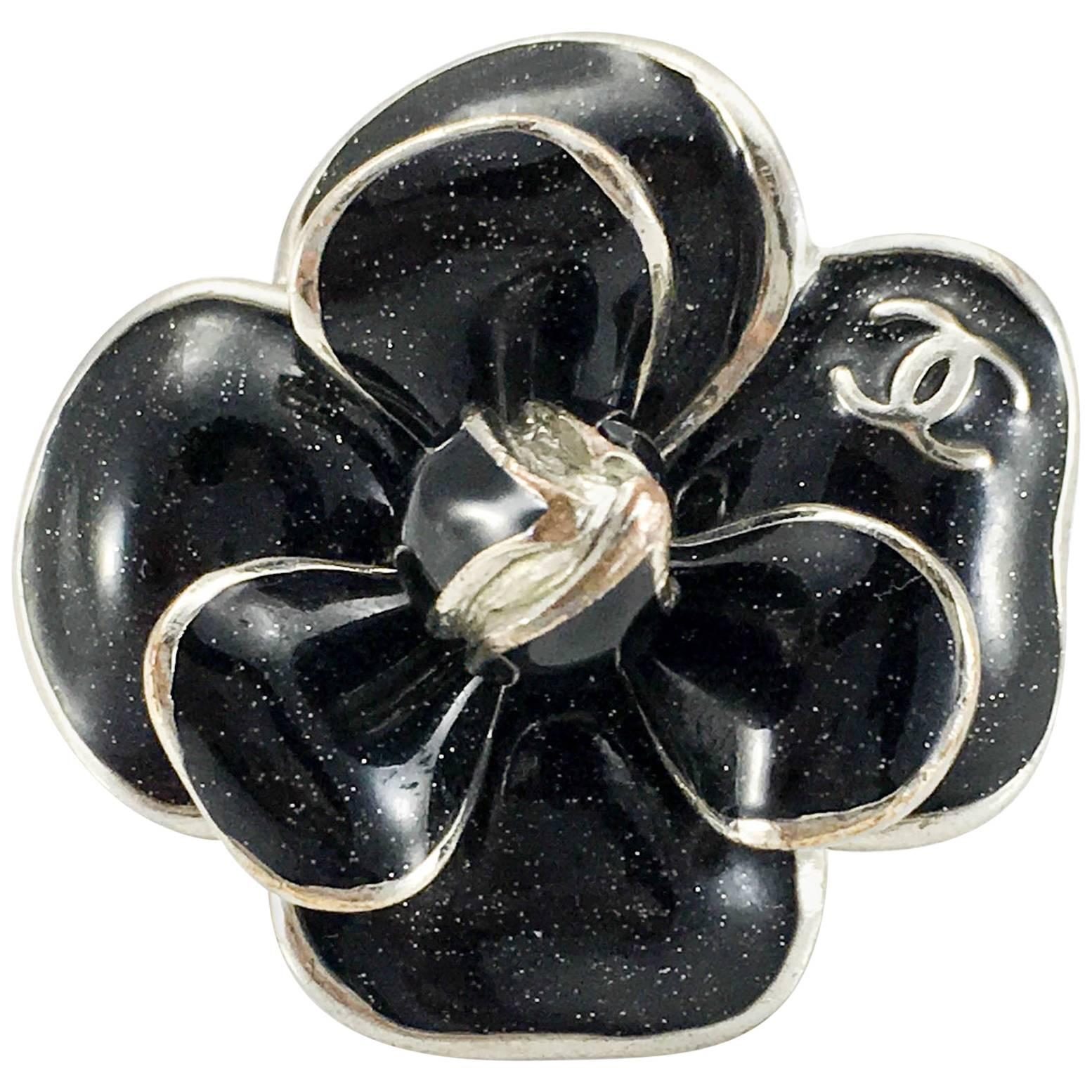 Sold at Auction: CHANEL Silver Black Enamel Camellia Hoop Earrings