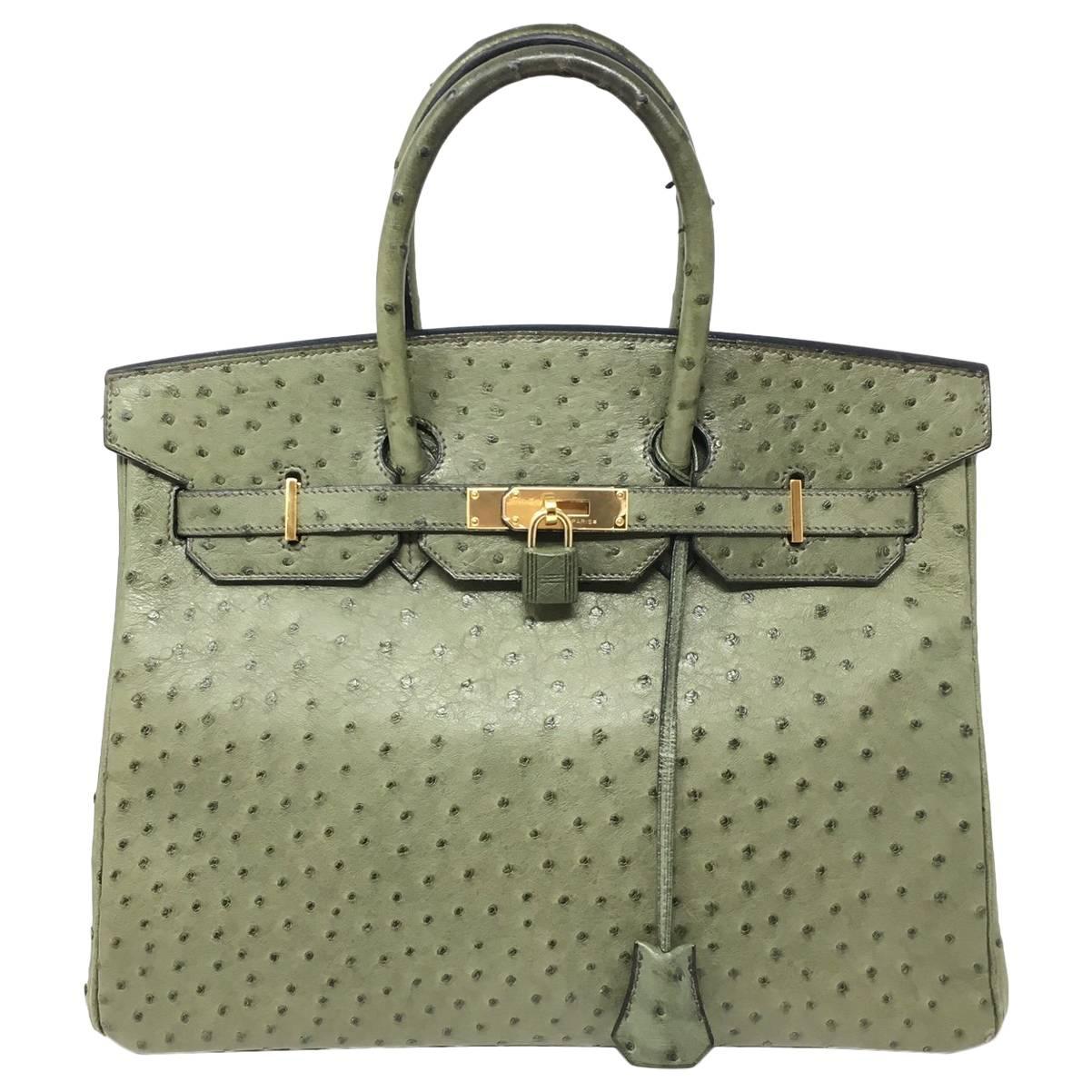 Kelly 35 leather handbag Hermès Green in Leather - 21519483