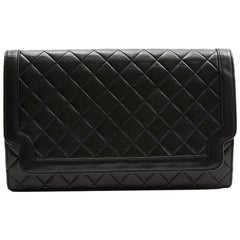 CHANEL Vintage Clutch in Black Quilted Leather