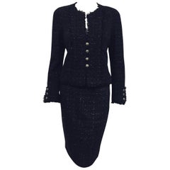 Consistent Chanel Black Tweed Suit with Fringed Neckline, Cuffs, Closure & Hem