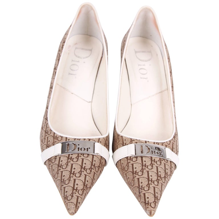 brown and white pumps