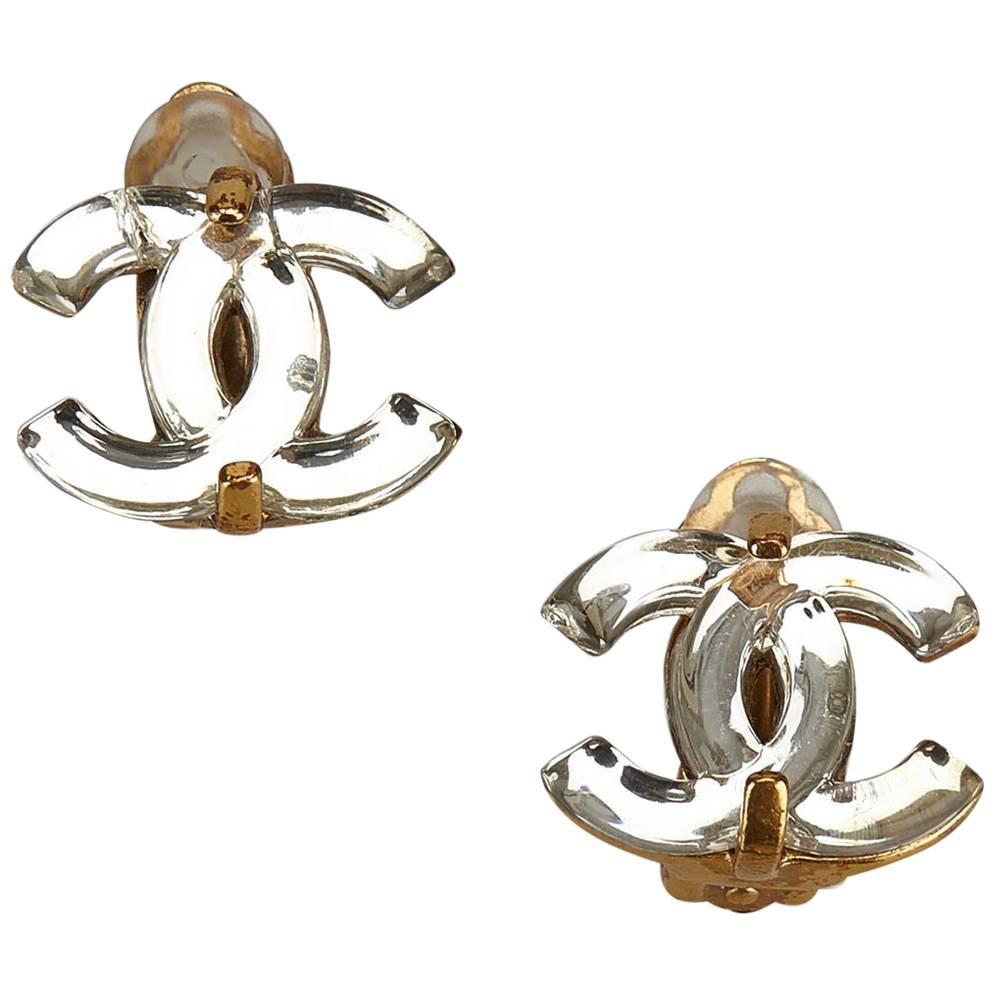 Chanel Gold Toned x Silver Plastic "CC" Clip on Earrings