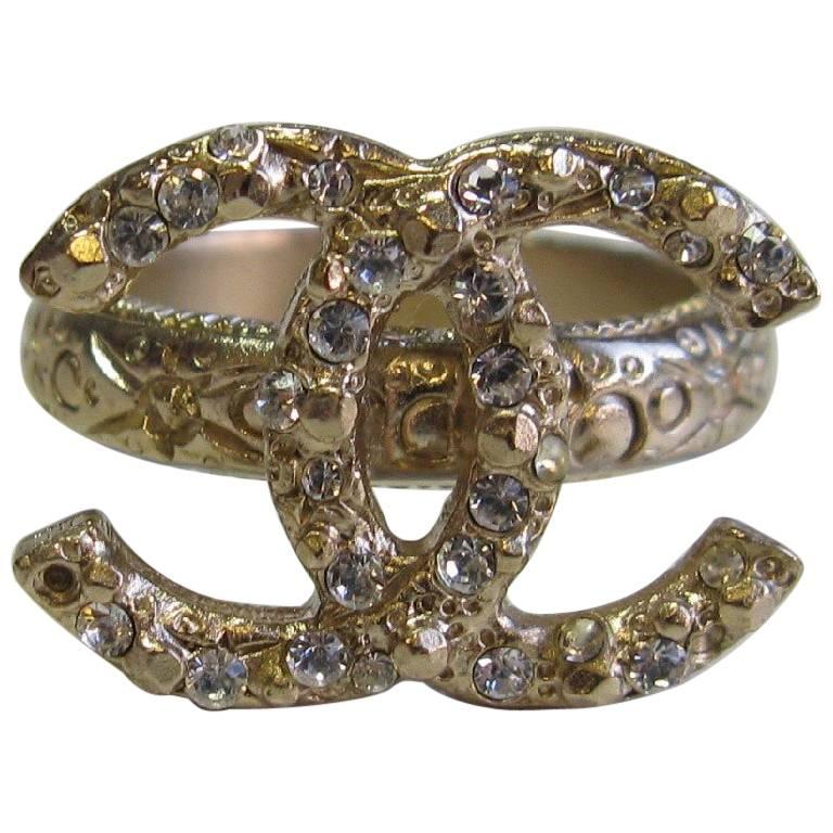 CHANEL CC Ring in Pale Gilded Metal set with Small White Rhinestones