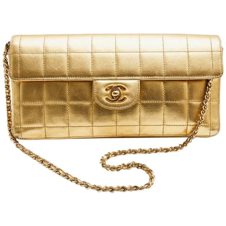 CHANEL Baguette Bag in Gilded Quilted Leather