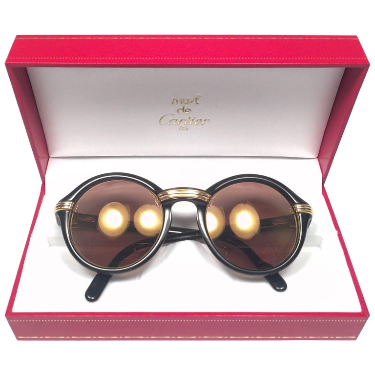 Mint Cartier Cabriolet Round Black and Gold 49MM 18K Gold Sunglasses France 1990's at 1stdibs