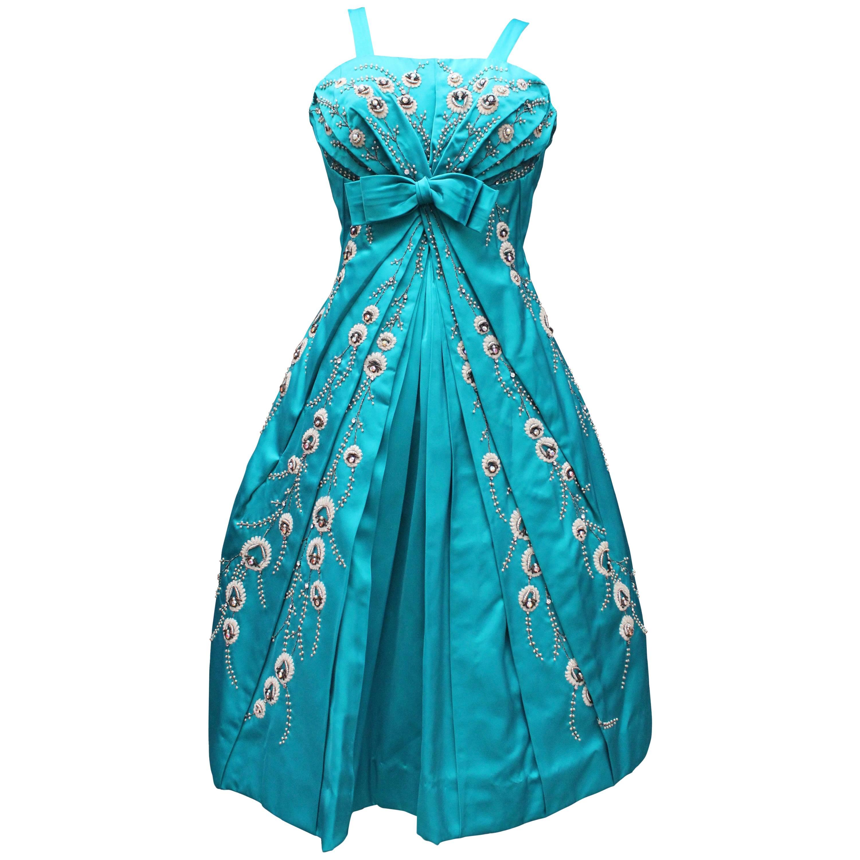 Modissa turquoise satin cocktail dress with bead embroideries For Sale