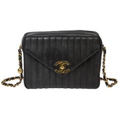 Chanel Vintage Front Pocket in black vertical quilted caviar leather