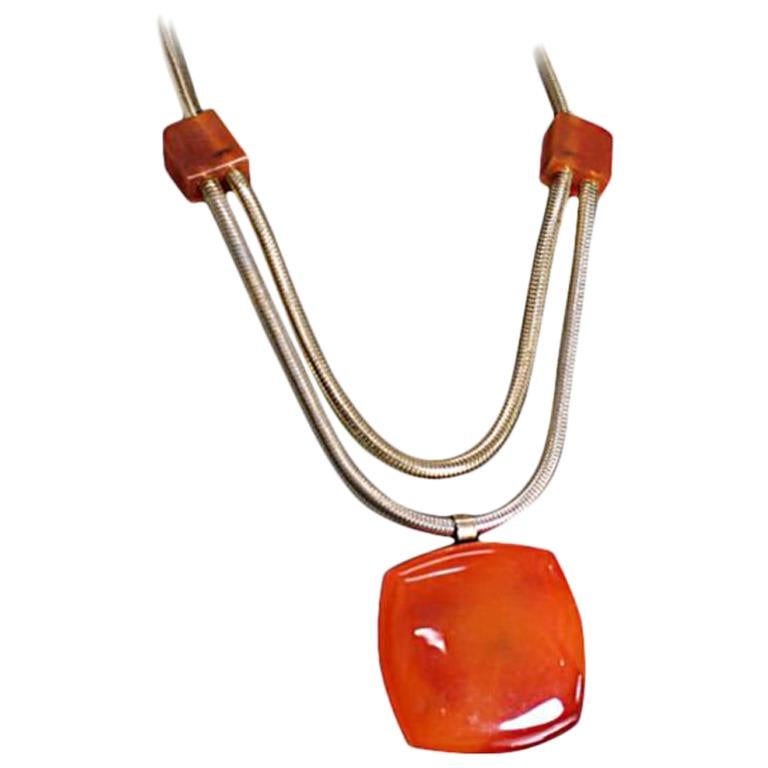 Collana Lanvin in bachelite e catena di serpenti