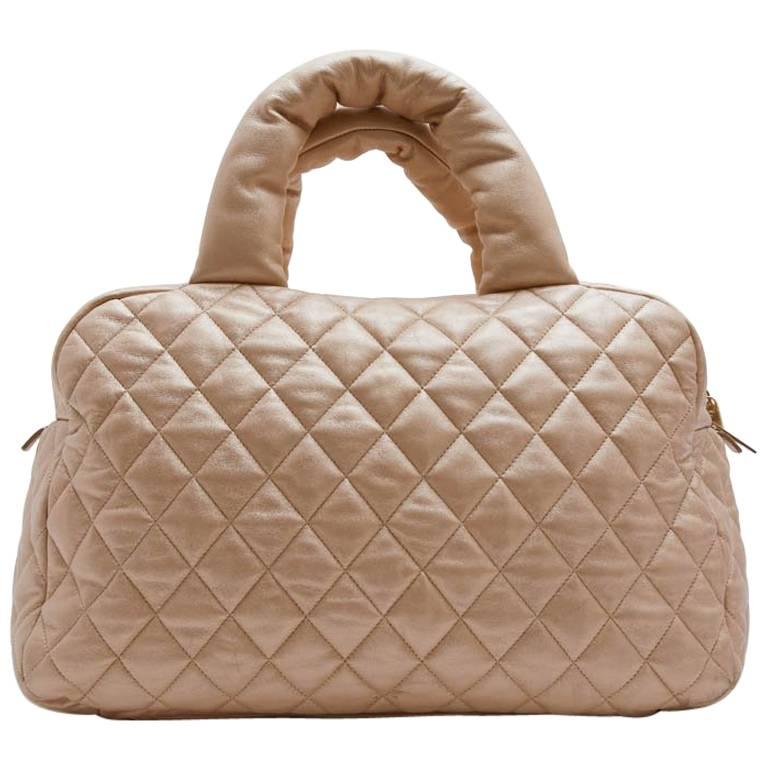 CHANEL 'Cocoon' Bag in Gold Quilted Leather