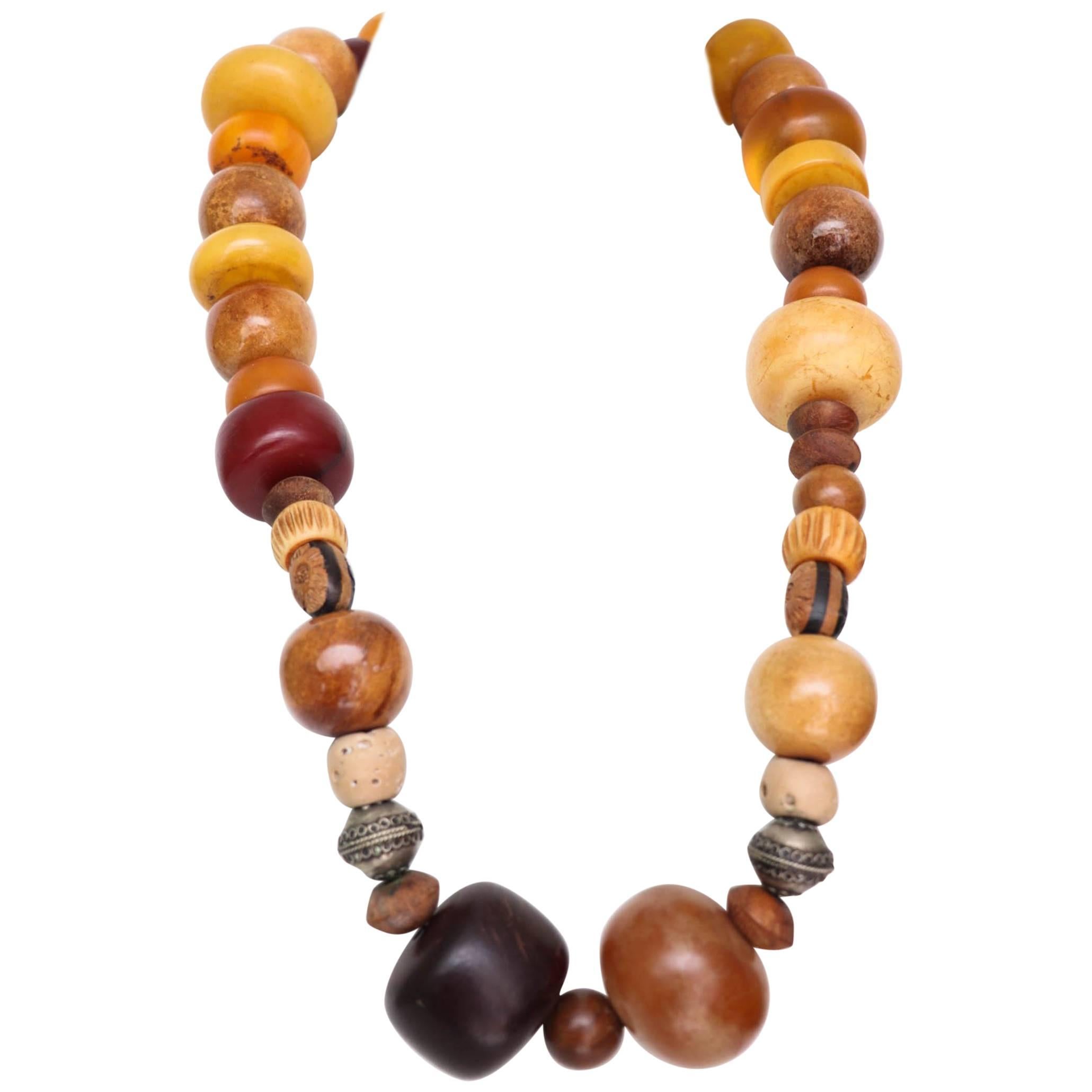A 1970s Vintage Amber, Bone & Wood Beaded Necklace 