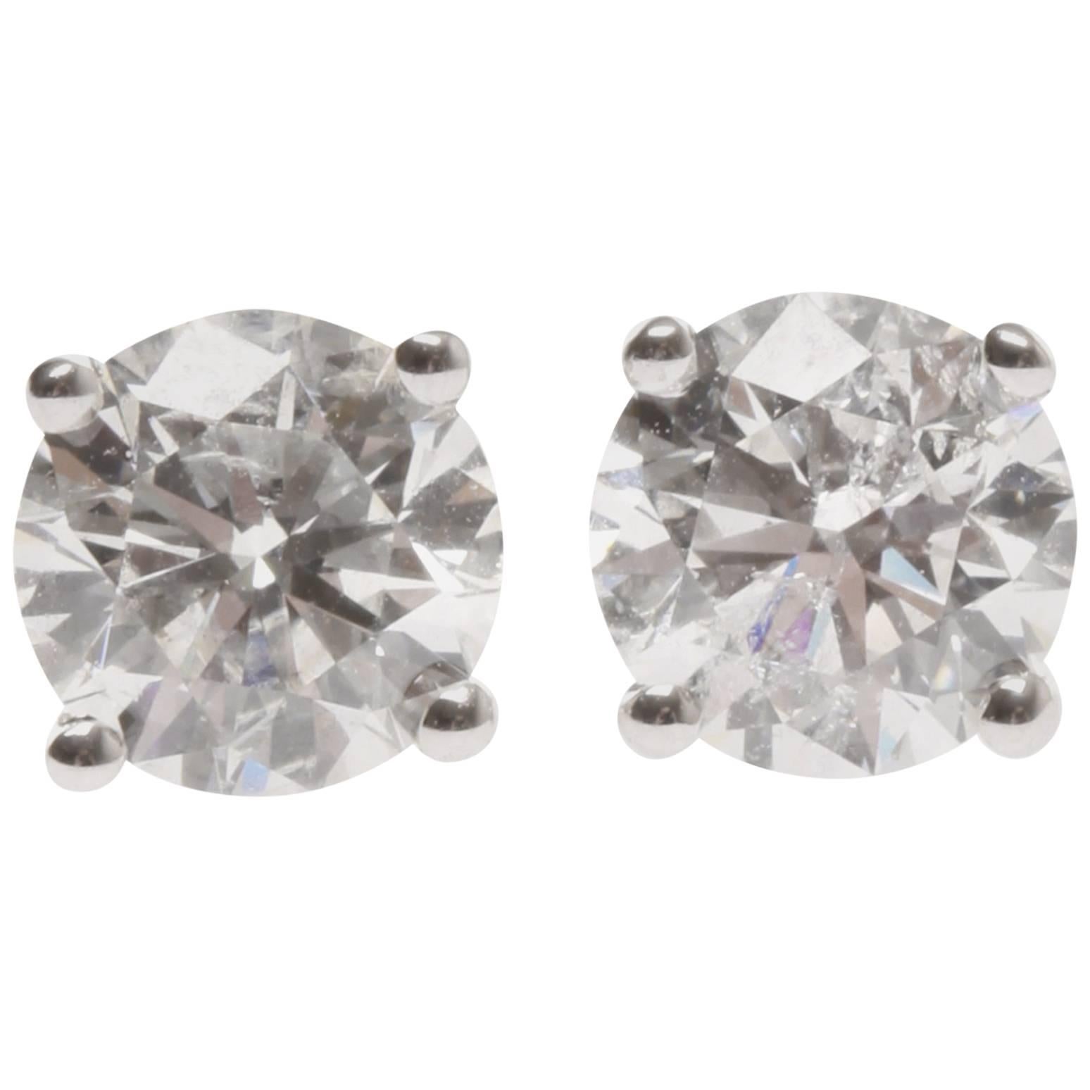 	Lady's 18ct white gold diamond earrings For Sale