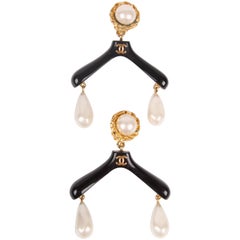 Retro Chanel black white and gold Pearl Coat Hanger Earrings, 1980s