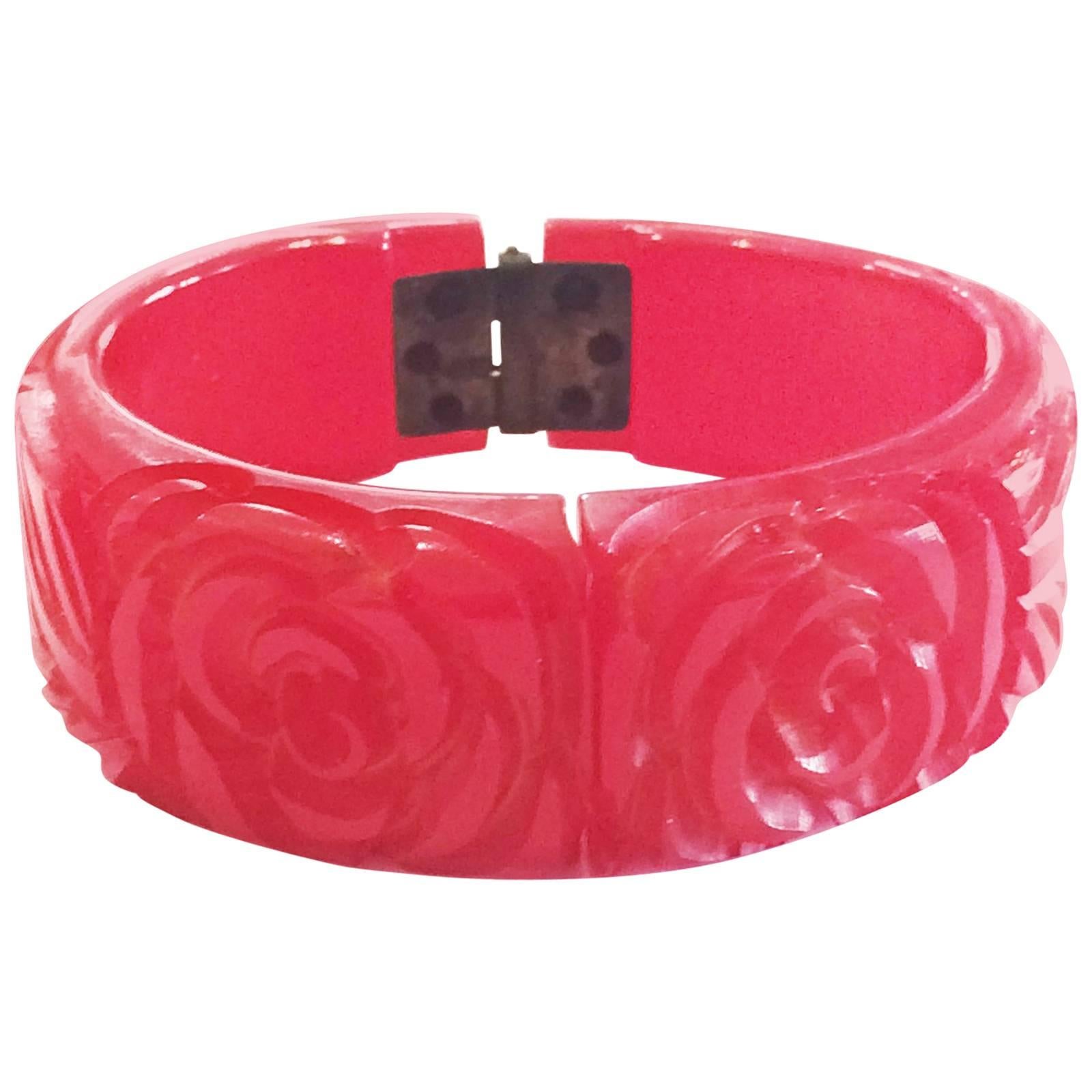 Art Deco deeply Carved Bakelite Hinged Clamper Bangle in brilliant Ruby red  For Sale