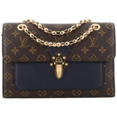 Louis Vuitton Victoire Handtasche Monogram Canvas und Leder