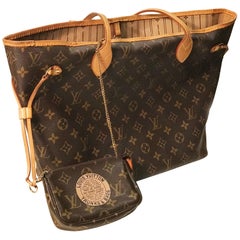 Louis Vuitton monogram Neverfull MM Canvas Shoper bag.
